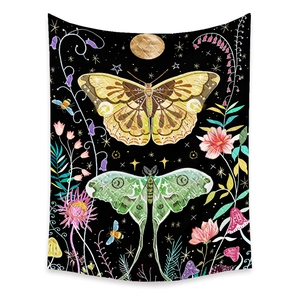 Macro shot of colorful moth and floral motifs on Bohemian tree of life wall tapestry