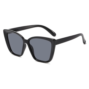 Fashionable black cat eye sunglasses with gray lenses and wide hollow out temples