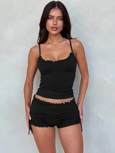 Women's two-piece black camisole and lettuce-trim shorts set for summer fashion wear