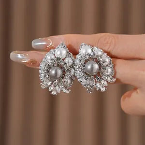 Vintage style sterling silver needle earrings with grey pearls and cubic zirconia clusters