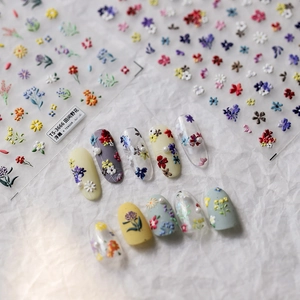 3D embossed wildflower nail stickers with yellow daisies and purple petals for nail art