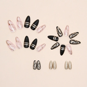 Black almond press-on nails set with gold foil and marble patterns for chic look