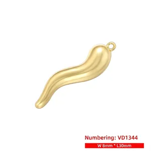 Detail of gold S-shaped chili pendant VD1344, measuring 8mm wide and 30mm long