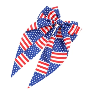 American flag hair bow clip with red white and blue stars and stripes for 4th of July