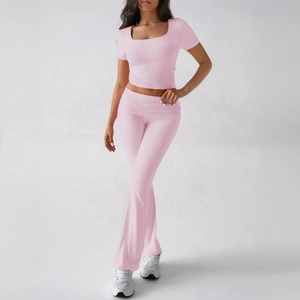 Pink Y2K two-piece set with square neck crop top and high-waisted flared pants