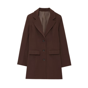 Detail of deep brown blazer featuring peaked lapels and professional three-button closure