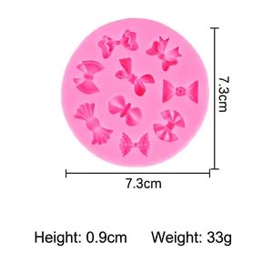 Pink silicone mold featuring 8 butterfly bow designs for fondant, chocolate and baking