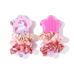 Cute star-shaped transparent hairbrushes with unicorn print and pink silk hair ties