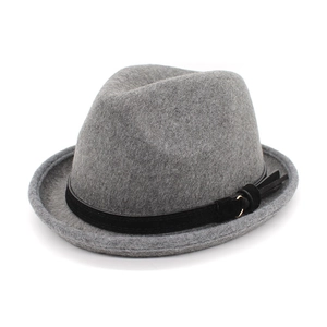 Detail of grey wool felt bowler hat with black leather band and golden buckle