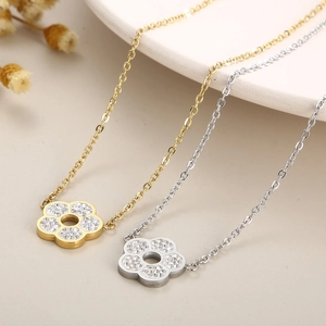 Titanium steel flower pendant necklaces in gold and silver set with sparkling crystals