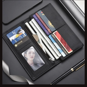 Detail of black leather long wallet with multi-card slots and a zipper compartment