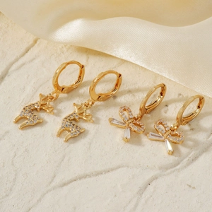 Exquisite gold-plated deer and bow earrings set with sparkling cubic zirconia crystals
