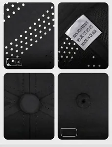 Detail view of breathable laser-cut holes and 100% polyester fabric on black baseball cap