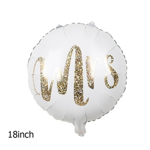 Detailed view of 18 inch white round foil balloon with gold glitter Mrs lettering