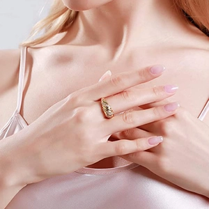 Elegance gold twisted croissant ring with zircon pave, worn on finger for jewelry fashion