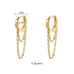Detail view of gold tassel earrings showing 13mm outer and 9.2mm inner dimensions