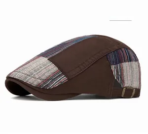 Detail view of coffee-colored ivy cap featuring side striped panel and bronze metal buckle