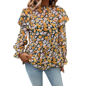 Women floral long sleeve peplum top in yellow with ruffle details on white background
