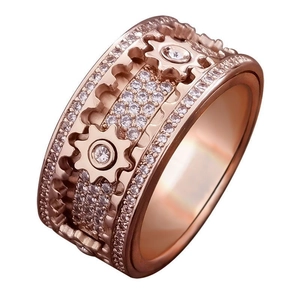 Mechanical gear spinning ring in rose gold with shimmering cubic zirconia pavé