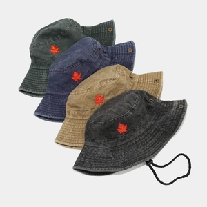 Unisex bucket hats in four colors with red maple leaf embroidery and windproof cord