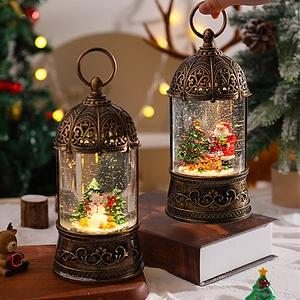 Close-up of vintage bronze Christmas lanterns with Santa Claus and Snowman scenes