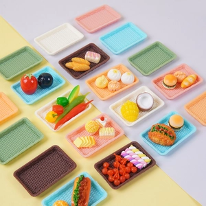 Miniature dollhouse food set with imitation rattan trays and assorted resin snacks