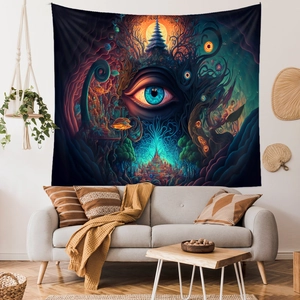 Detailed view of mushroom tapestry with surreal eye pattern hung over a living room sofa