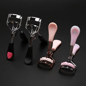 Professional eyelash curlers with built-in comb in assorted pink and black heart designs