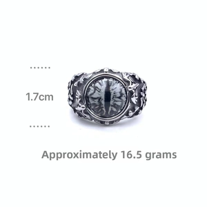 Macro shot of gothic dragon eye ring showing 1.7cm height and 16.5g weight details