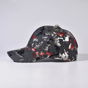 Metallic camouflage baseball cap with silver and red foil texture on black fabric
