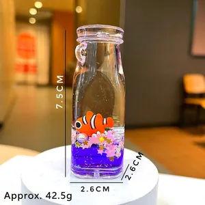 Detail view of clownfish liquid driftwood bottle keychain showing 7.5cm height and 42.5g weight