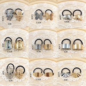 Set of minimalist alloy ponytail holders in gold and silver with geometric designs