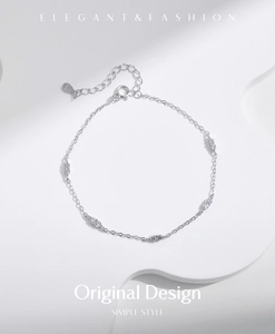 Detail of S925 sterling silver chain bracelet with oval crystals and authenticity tag