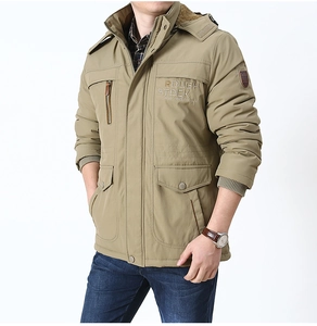 Detail of khaki outdoor jacket showing fleece lining and Rough Stock embroidery