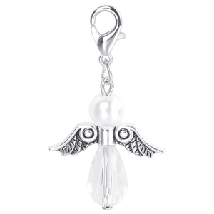 Macro shot of silver angel wing pendant with white pearl and faceted crystal teardrop