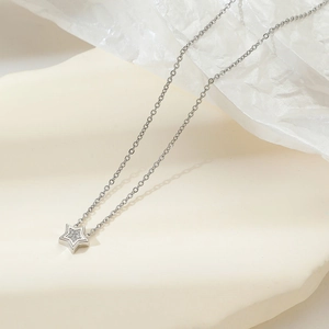 Sparkling star pendant necklace with cubic zirconia on elegant silver chain for women
