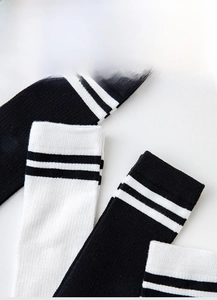 Detail of high-elastic Lycra sock mouth with 0.2mm ultra-thin black and white stripes
