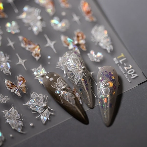 3D embossed holographic butterfly nail art stickers with star motifs and pearl accents