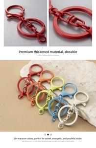 Macro view of macaron-colored metal lobster clasps and key rings in various pastel matte finishes