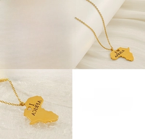 Detailed macro view of 18k gold plated stainless steel Africa map necklace pendant