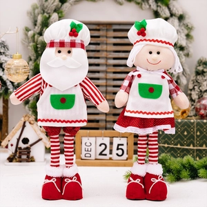 Details von ausziehbaren Weihnachts-Plüschfiguren mit Kochmützen und Teleskopbeinen