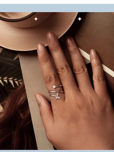 Elegant s925 silver multi-layer spiral ring with butterfly charms and white pearl detail
