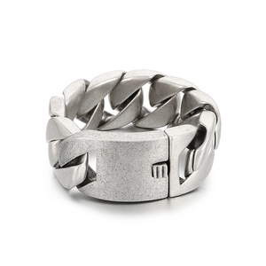 Rugged silver 31mm stainless steel Cuban chain bracelet for men in punk aesthetic