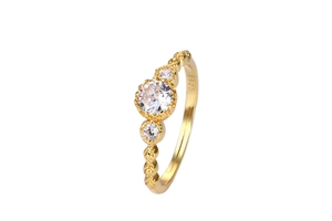 Macro shot of S925 sterling silver vintage lace ring with round zircon in gold finish