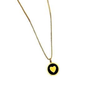 Minimalist heart pendant necklace with gold box chain on a clean white background