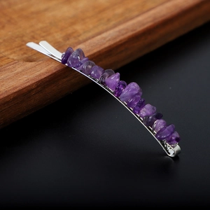 Handmade silver hair clip featuring natural purple amethyst crystal stones on a metal pin