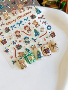 Detail of Christmas bear and tree nail stickers on false nails model YT3987