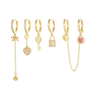 Six-piece set of gold-plated heart and lock earrings with pink zircon and bow tassels