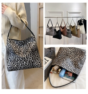 Detailed interior of a large capacity tote bag showing space for tablets and essentials