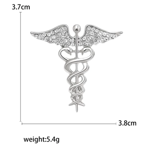 Silver medical caduceus brooch with crystals, size 3.7cm x 3.8cm on white background
